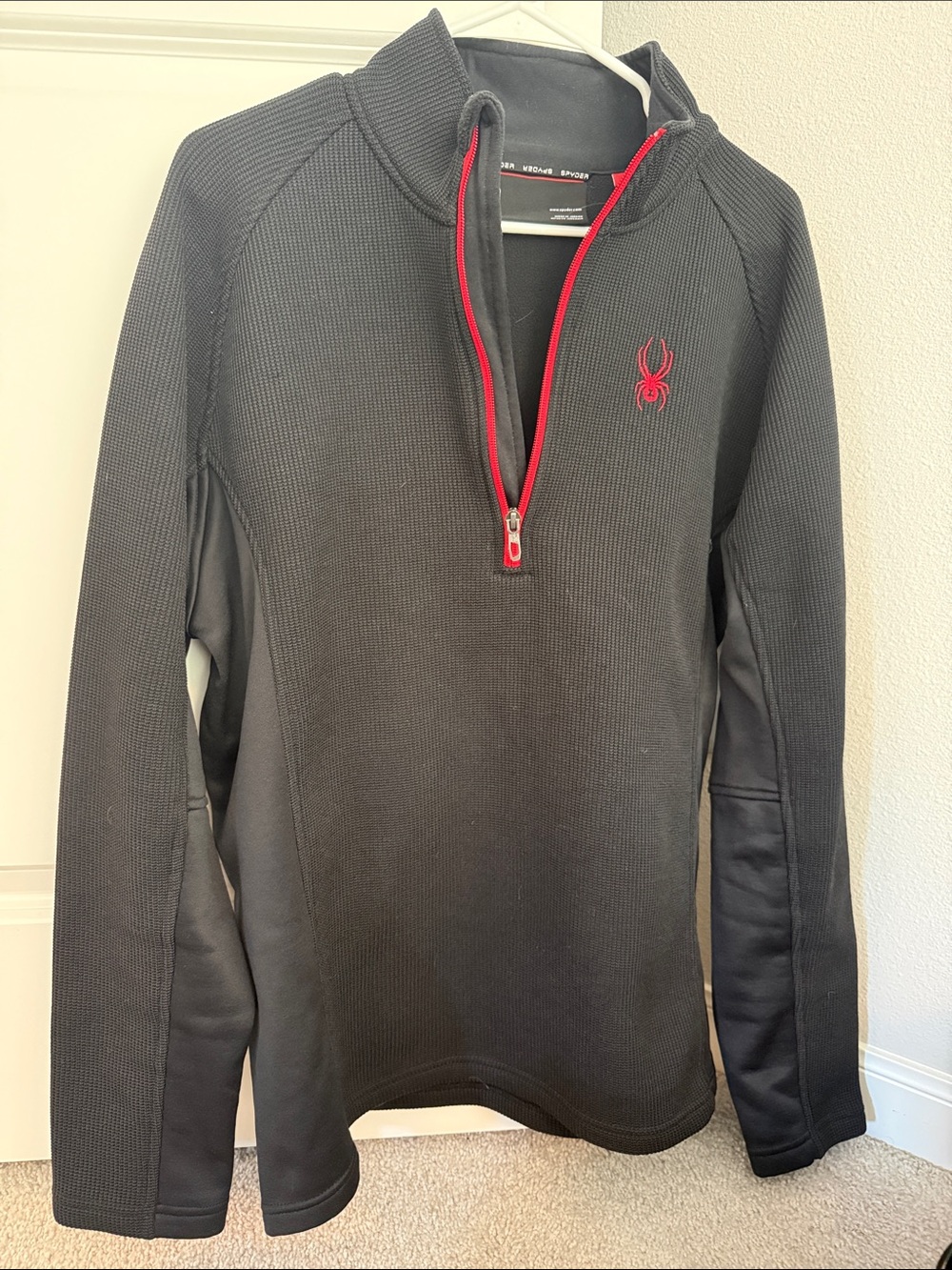 Spyder Men's Black Half-Zip Sweater with Red Trim and Logo